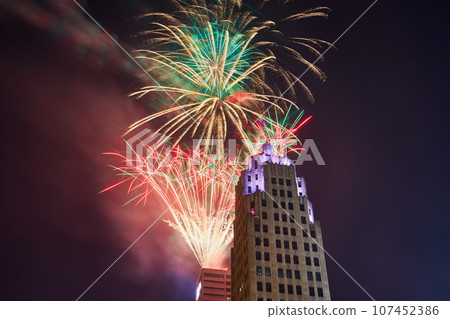 Top of purple Lincoln Tower with dazzling Fourth of July fireworks display in Fort Wayne Top of purple Lincoln Tower with dazzling Fourth of July fireworks display in Fort Wayne 107452386