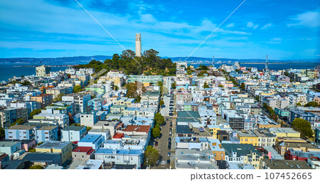 Aerial of houses and road leading to Telegraph Hill and Coit Tower with view of bay Aerial of houses and road leading to Telegraph Hill and Coit Tower with view of bay 107452665