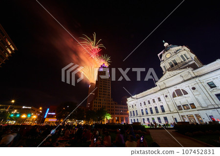 Downtown Fort Wayne courthouse lawn with crowd watching 4th of July fireworks over Lincoln Tower Downtown Fort Wayne courthouse lawn with crowd watching 4th of July fireworks over Lincoln Tower 107452831