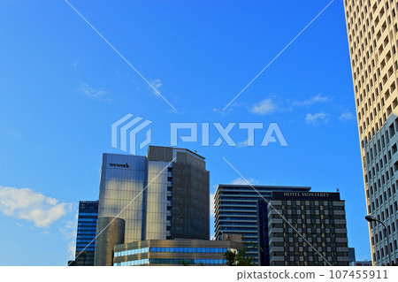 High-rise buildings that shine against the blue sky - the cityscape of Osaka High-rise buildings that shine against the blue sky - the cityscape of Osaka 107455911