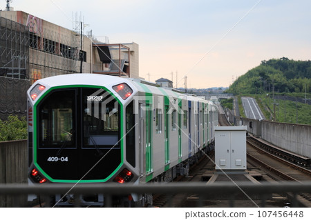 Osaka Metro Chuo Line new vehicle 400 series from the station platform Osaka Metro Chuo Line new vehicle 400 series from the station platform 107456448