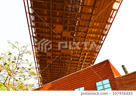 Buildings and plants under the bridge Buildings and plants under the bridge 107456885