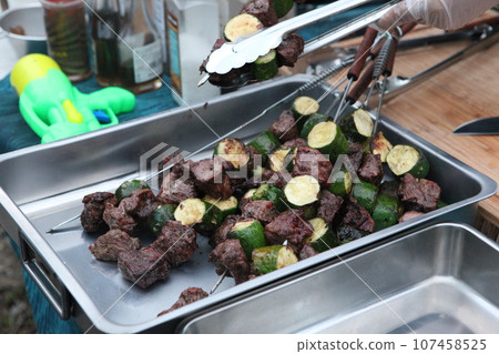 cooking meat on the barbecue cooking meat on the barbecue 107458525