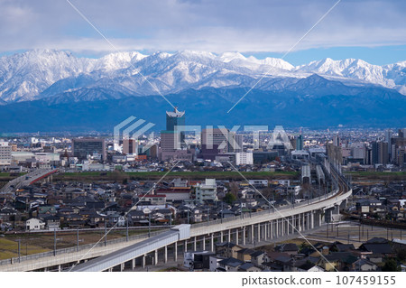 Toyama City and the snow-covered Kotsurugidake Kekatsu Sanzan Northern Alps seen from the Tateyama Aogu special seat Mt. Kureha Observation Deck Toyama City and the snow-covered Kotsurugidake Kekatsu Sanzan Northern Alps seen from the Tateyama Aogu special seat Mt. Kureha Observation Deck 107459155