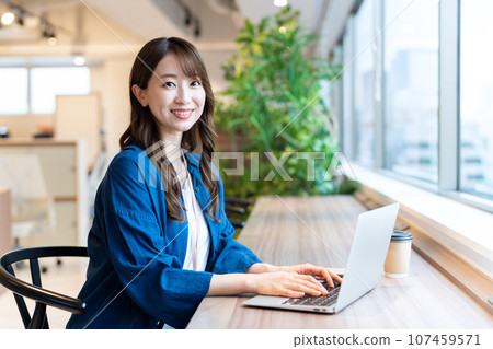 A female engineer working on a computer in the office Photography cooperation: WEEK Shiba Daimon (Sun Frontier Real Estate) 107459571