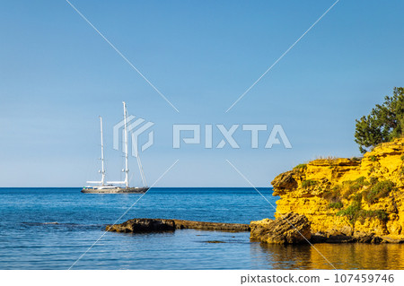 View of sailing boat from coast at the Castellammare del Golfo. 107459746