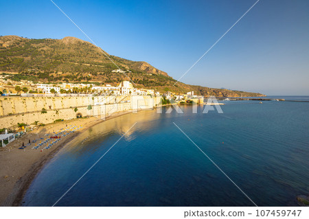 City beach in Castellammare del Golfo at sunrise. City beach in Castellammare del Golfo at sunrise. 107459747