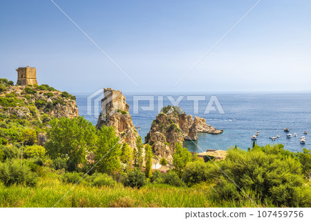 Faraglioni of Scopello - The stacks of Scopello, rocky peaks. Faraglioni of Scopello - The stacks of Scopello, rocky peaks. 107459756