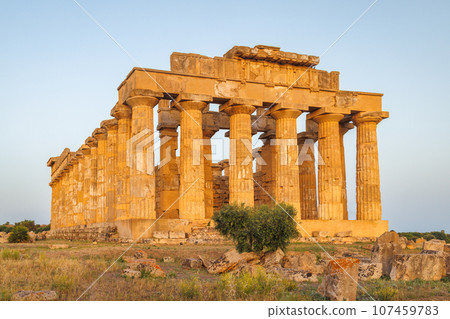 Temple of Hera in Selinunte at sunset. The archaeological site. Temple of Hera in Selinunte at sunset. The archaeological site. 107459783