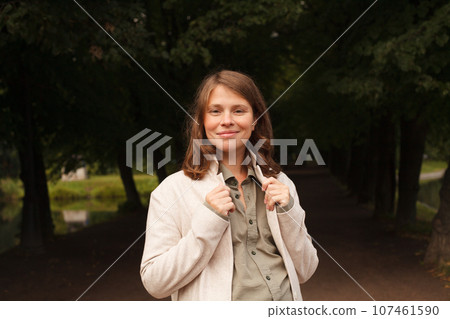 Perfect young smiling pregnant woman, outdoor portrait Perfect young smiling pregnant woman, outdoor portrait 107461590