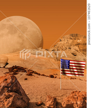 Red planet with dry land landscape and American flag, science fiction background. Red planet with dry land landscape and American flag, science fiction background. 107461620