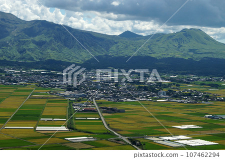 View from Aso City's "Shiroyama Observation Deck" - Aso Five Mountains and a patchwork-like rural landscape 107462294