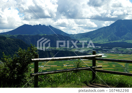 View from Aso City's "Shiroyama Observation Deck" - Aso Five Mountains and a patchwork-like rural landscape 107462298