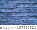 Organic knit background with macro woven threads. 107462521
