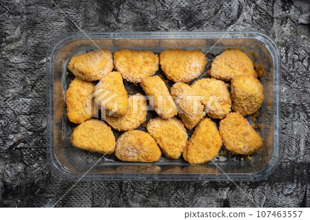 Fried chicken breast - nuggets 107463557