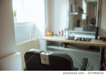 modern beauty salon with chairs and mirror modern beauty salon with chairs and mirror 107466838