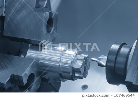 The CNC lathe machine milling cut the metal shaft parts by milling spindle. The CNC lathe machine milling cut the metal shaft parts by milling spindle. 107469544