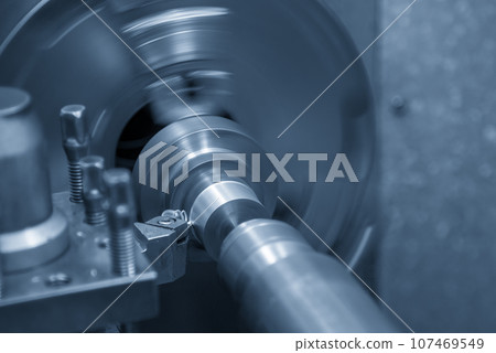Close up scene the lathe machine rough cut  metal tube parts. 107469549