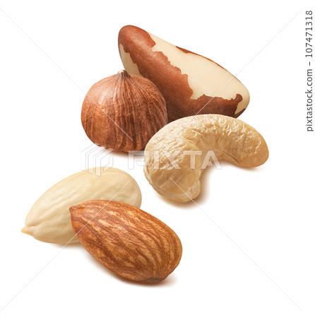 Brazil nuts, cashew, blanched almond and hazelnut isolated on white background Brazil nuts, cashew, blanched almond and hazelnut isolated on white background 107471318