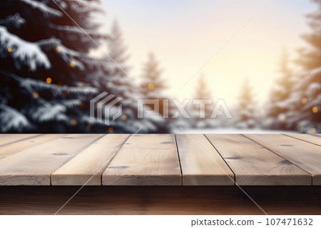 Empty wooden table in front of blurred winter holiday landscape background Empty wooden table in front of blurred winter holiday landscape background 107471632