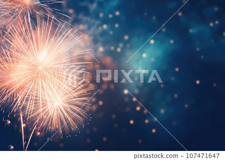 Fireworks at New Year with copy space on blue background 107471647