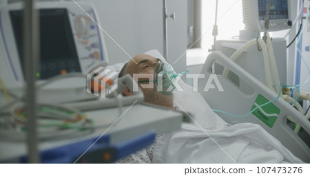Old patient with pneumonia in emergency room in clinic Old patient with pneumonia in emergency room in clinic 107473276