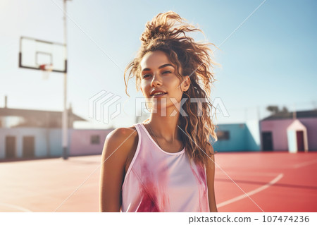 Attractive young woman street basketball players portrait on on basketball court 107474236