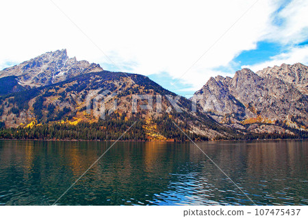 Grand Teton National Park in autumn, United States, view from Jenny Lake east shore boat pier Grand Teton National Park in autumn, United States, view from Jenny Lake east shore boat pier 107475437