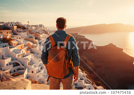 Santorini's Beauty Adventurous Tourist Man with Backpack Basks in Front of the Iconic Oia Sunset. created with Generative AI Santorini's Beauty Adventurous Tourist Man with Backpack Basks in Front of the Iconic Oia Sunset. created with Generative AI 107475438