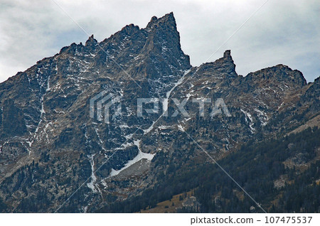 Grand Teton National Park in autumn, United States of America, Tetons reflected in Jenny Lake seen from the shuttle boat Grand Teton National Park in autumn, United States of America, Tetons reflected in Jenny Lake seen from the shuttle boat 107475537