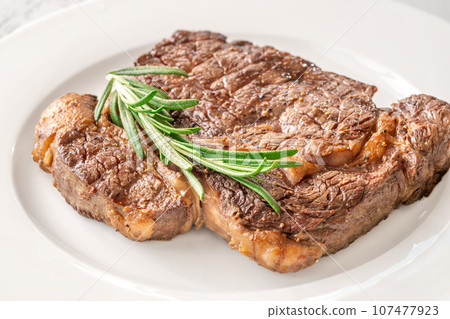 Rib eye steak 107477923