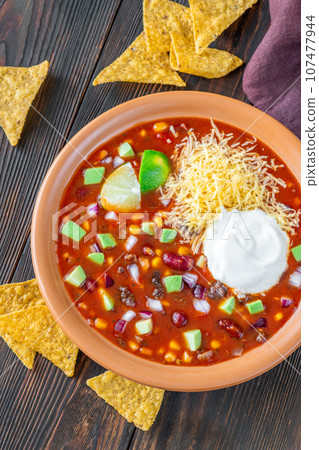 Bowl of taco soup 107477944