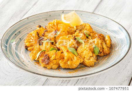 Garlic parmesan roasted cauliflower Garlic parmesan roasted cauliflower 107477951