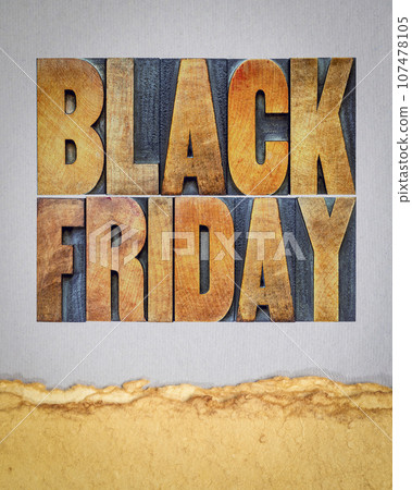 Black Friday, holiday shopping event - poster in vintage letterpress wood type blocks on art paper 107478105