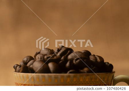 coffee beans cup coffee beans cup 107480426