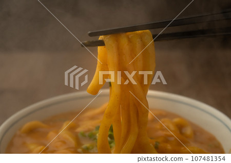 Curry udon with chopsticks Curry udon with chopsticks 107481354