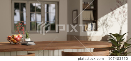 Copy space on a wooden kitchen island or countertop in a modern minimalist kitchen. Copy space on a wooden kitchen island or countertop in a modern minimalist kitchen. 107483550