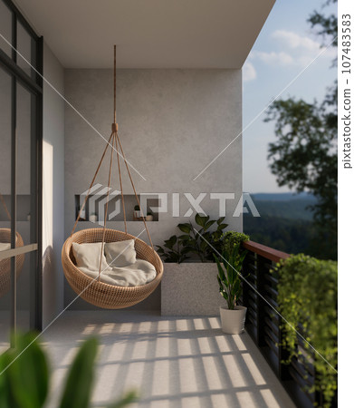 A modern beautiful home balcony with a hanging wicker armchair lounge and a beautiful nature view. A modern beautiful home balcony with a hanging wicker armchair lounge and a beautiful nature view. 107483583