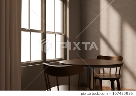 A dark wooden table and chairs by the window in a cosy minimalist Scandinavian living room. 107483956