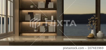 Copy space on a luxury marble tabletop in a modern luxury living room with built-in shelves. 107483969