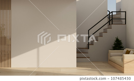 Empty white wall mockup in a cozy contemporary living room with modern stairs to the 2nd floor 107485430