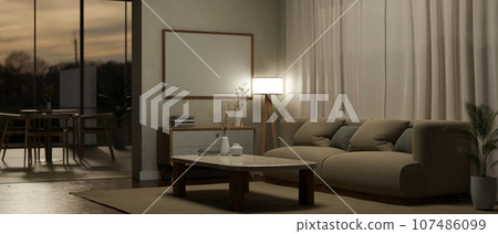 Interior design of a contemporary and cozy living room on the evening 107486099