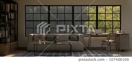 Interior design of a cozy living room with a couch and a coffee table on a carpet 107486100