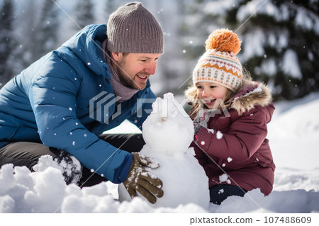 Father and daughter building a snowman together on winter day. Happy family having fun while playing in snow outdoors. Generative AI. 107488609