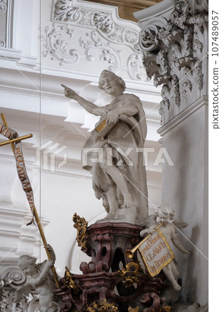 Saint John the Baptist, statue on the pulpit in the Basilica of St. Martin and Oswald in Weingarten, Germany 107489057