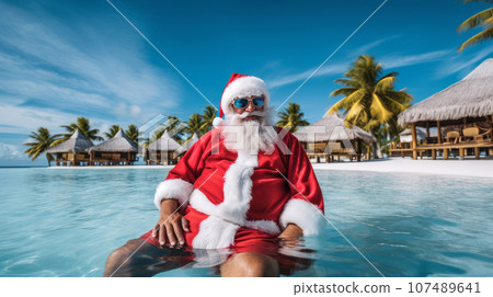 Santa Claus in the Maldives, where there is a quiet and calm lagoon with crystal clear azure water Santa Claus in the Maldives, where there is a quiet and calm lagoon with crystal clear azure water 107489641
