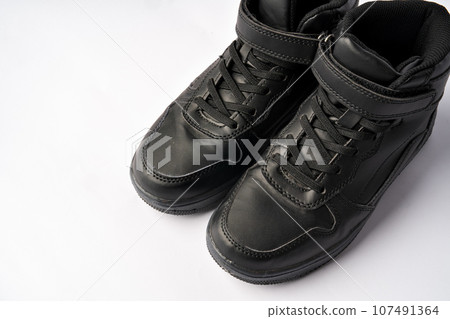 Pair of new sneakers isolated on white background 107491364