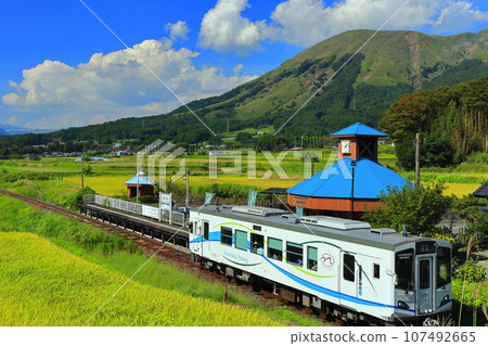 [Kumamoto Prefecture] Minami Aso Railway and Mt. Aso on a sunny day (Hakusui Kogen Station) 107492665
