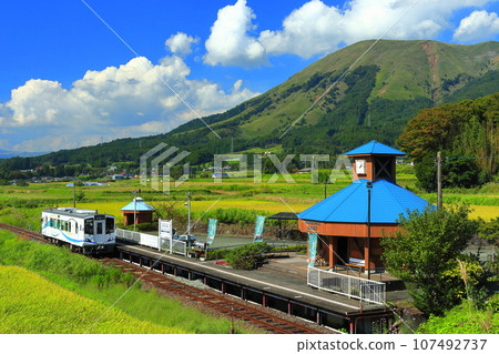 [Kumamoto Prefecture] Minami Aso Railway and Mt. Aso on a sunny day (Hakusui Kogen Station) 107492737