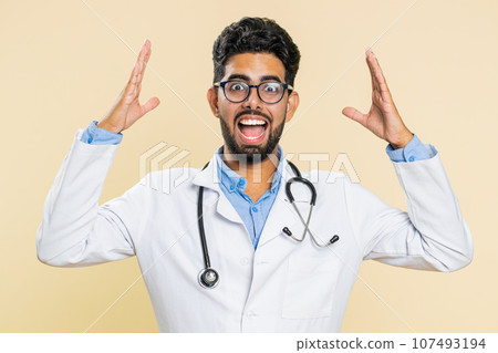 Irritated angry Indian doctor man screams from stress tension problems, shock, rage, nervous quarrel Irritated angry Indian doctor man screams from stress tension problems, shock, rage, nervous quarrel 107493194